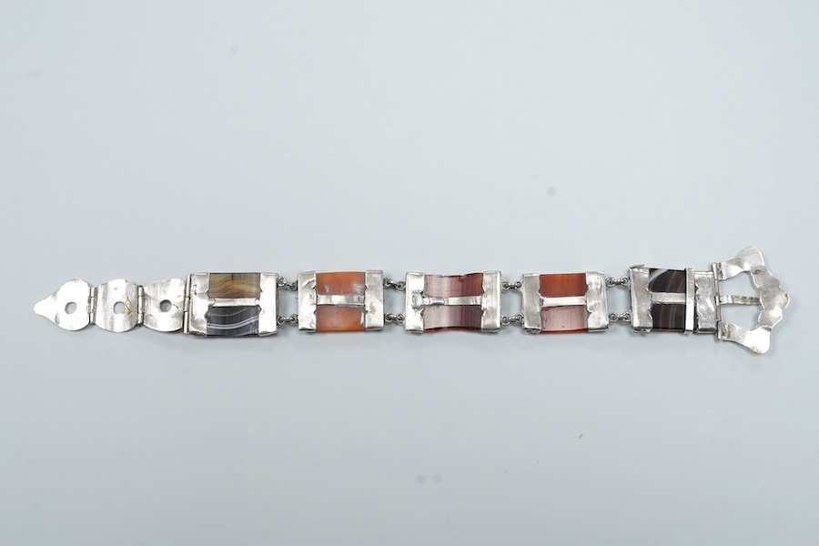 A Victorian Scottish engraved white metal and banded agate set bracelet, with buckle clasp, overall length 21.8cm.